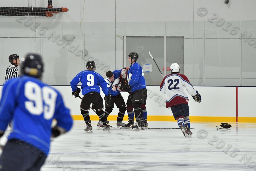 Wheaton College Men\'s Ice Hockey vs Middlesex Community College. - Photo By: KEITH NORDSTROM